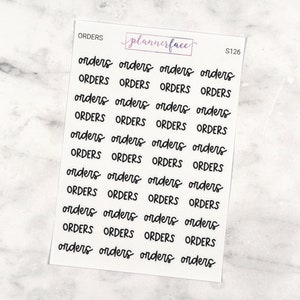May include: A sheet of planner stickers with the word "orders" repeated in various sizes and styles. The text "plannerface" and "S126" are also visible on the sheet.