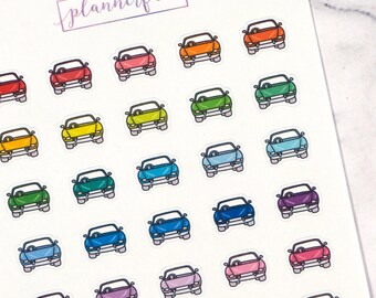 May include: A sheet of colorful car stickers with a white background. The stickers are arranged in a grid pattern and feature a variety of colors, including red, orange, yellow, green, blue, purple, and pink. The stickers are all the same size and shape, and they feature a simple design of a car with a steering wheel.