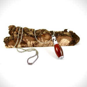 Satin Chrome aromatherapy necklace in walnut and bloodwood spiral