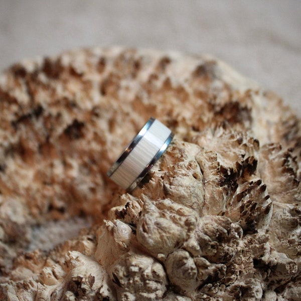 Stainless steel ring made with faux ivory