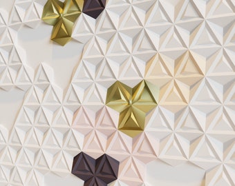 May include: A white wall with a geometric pattern of raised triangles. The pattern is interrupted by three-dimensional shapes in gold and brown.
