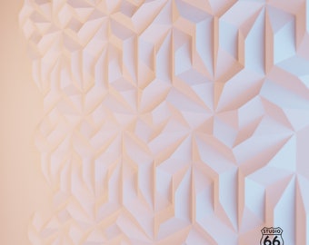 May include: A white, geometric wall panel with a repeating starburst pattern. The panel has a 3D effect with shadows and highlights, creating depth. The Studio 66 Designs logo is in the lower right corner.