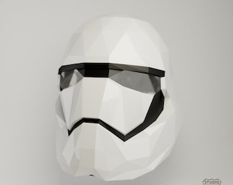 May include: White origami helmet with black details, resembling a Stormtrooper helmet from Star Wars.