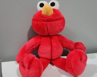 Sesame Street Elmo 10 inch Poseable Plush Doll The Muppets Red Lovable Monster