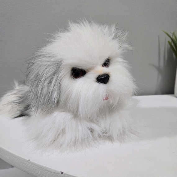 Black and white dog plush sales