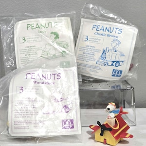 Vintage 1989 McDonalds Peanuts Racers: Charlie Brown, Lucy, Woodstock en Snoopy