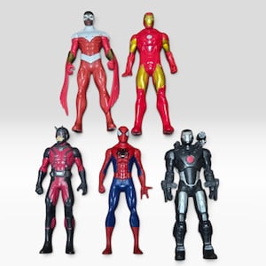 May include: A collection of five superhero action figures. The top row features a red and white character with wing-like attachments and a red and gold armored figure. The bottom row includes a red and black figure, a red and blue figure, and a black and silver armored figure.