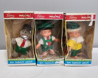 Mini bambole tedesche vintage in celluloide bavarese, ragazzo, ragazza e lupo floccato
