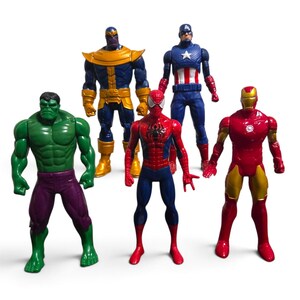 May include: A set of five superhero action figures including a green Hulk with purple pants, a gold and blue Thanos, a red and blue Spider-Man, a blue Captain America with a white star, and a red and gold Iron Man standing in a group.