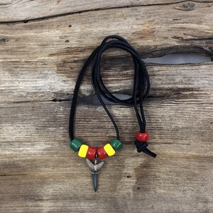 Fossilized Sand Tiger Shark Tooth Necklace Adjustable to 24&quot; on Black Suede with Red, Yellow, and Green Glass Beads