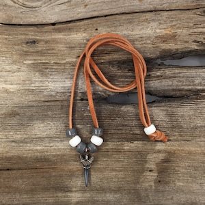 Fossilized Sand Tiger Shark Tooth Necklace Adjustable to 24&quot; on Cinnamon Suede with Gray and White Glass Beads