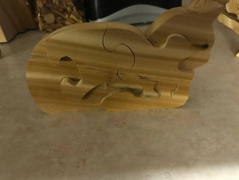 Sitting wood kitty