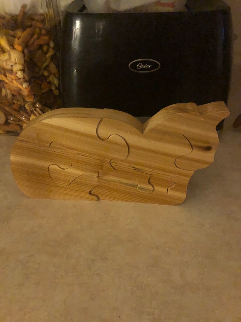 Sitting wood kitty