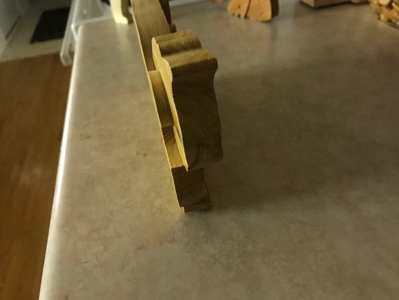 Sitting wood kitty