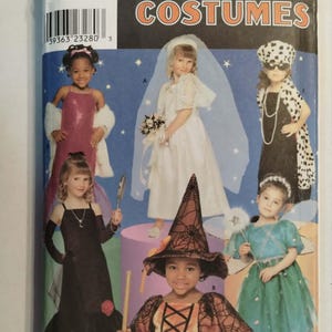 May include: A Simplicity Costumes sewing pattern envelope featuring illustrations of children in various outfits including a white bridal gown, a black dress with a dalmatian print cape, a black gown, a witch costume, and a teal dress with wings.