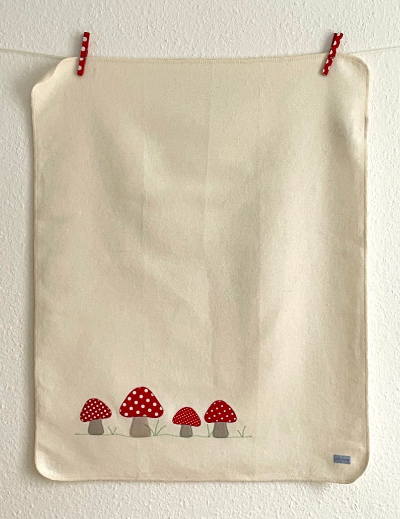 Baby blanket Toadstools creme / rote Pilze