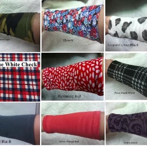 May include: A collection of arm warmers in various patterns and colors, including camouflage, floral, leopard print, plaid, solid black, solid orange red, and swirl. The text "Red Blue White Check" is visible in the center of the image.