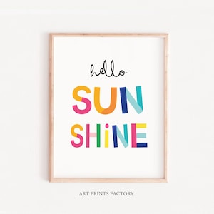 May include: A colorful framed print with the text "hello sunshine" in a playful font. The letters are made up of different colored stripes.