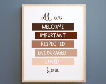 May include: A framed print with the text "all are WELCOME IMPORTANT RESPECTED ENCOURAGED LOVED here" in black handwritten font on a white background. The words are stacked vertically and each word is on a different colored bar. The bars are brown, dark brown, light brown, beige, and peach.