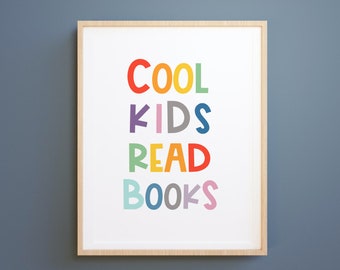 May include: A framed print with the text "COOL KIDS READ BOOKS" in colorful letters. The letters are in different colors, including red, orange, yellow, green, blue, purple, and pink.