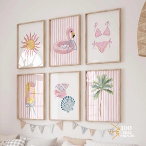 May include: A collection of six framed art prints with a beach theme. The prints feature watercolor illustrations of a sun, flamingo float, bikini, popsicle, seashells, and a palm tree. The background of each print has pink and white stripes. The text "100 FREE PRINTS!" is visible.