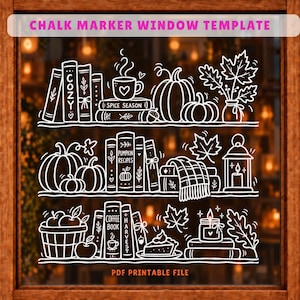 May include: A white line art window decal template featuring three shelves filled with autumn-themed illustrations including books labelled COZY, PUMPKIN RECIPES, COFFEE BOOK, and HARVEST, pumpkins, mugs, candles, leaves, and a pie. Text reads CHALK MARKER WINDOW TEMPLATE and PDF PRINTABLE FILE.