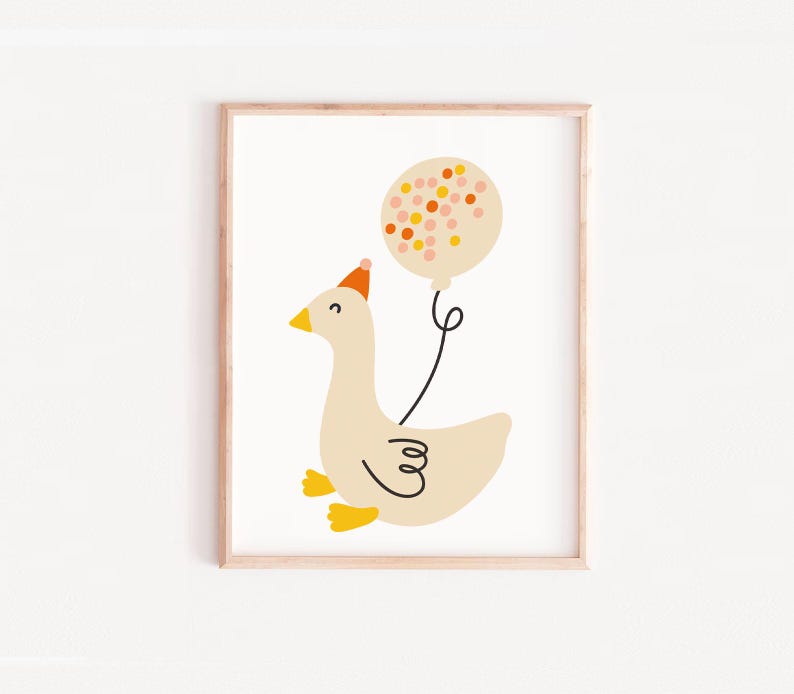 May include: A white goose wearing a party hat holds a pink and orange confetti balloon. The goose is smiling and has yellow feet. The balloon is tied to the goose's neck with a string.