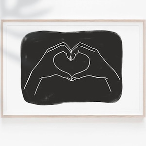 May include: A black and white line drawing of two hands forming a heart shape on a black background.