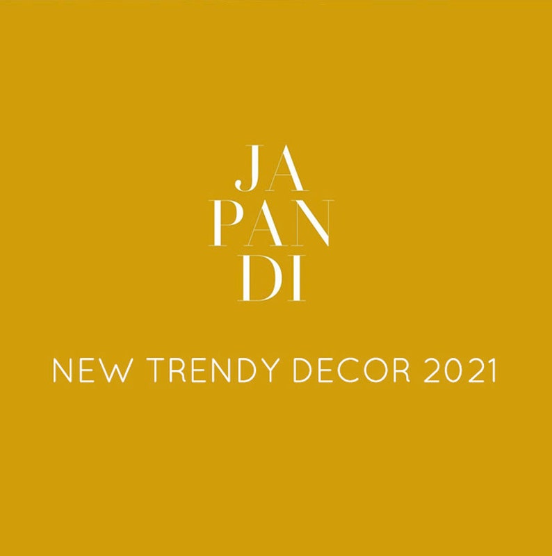 May include: A graphic design with the text "JAPANDI" in white on a yellow background. The text "NEW TRENDY DECOR 2021" is below the logo.