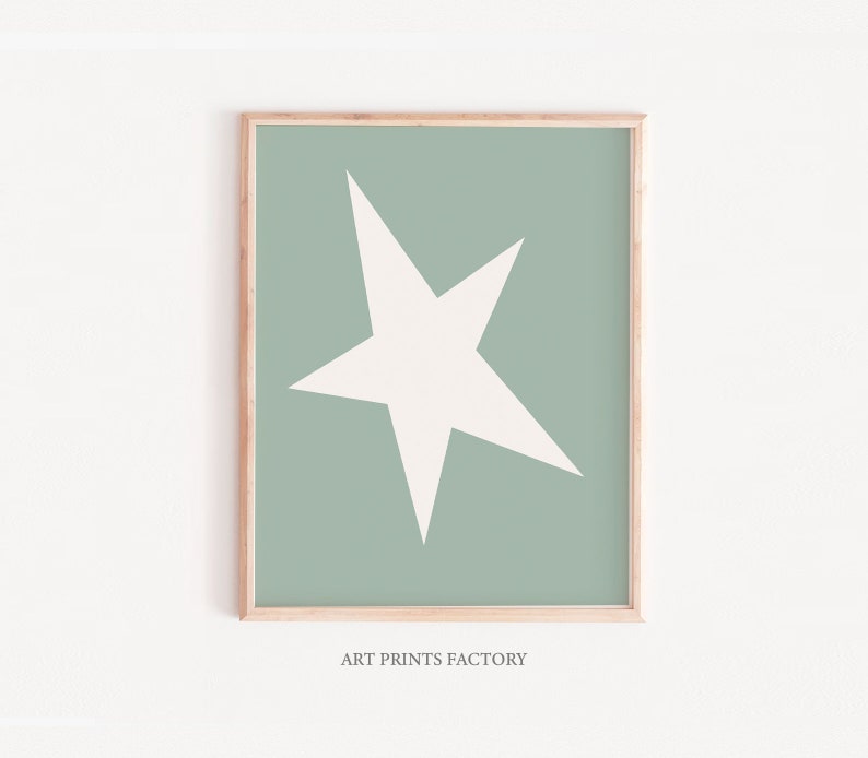 May include: A framed print featuring a white star on a sage green background. The print includes the text "ART PRINTS FACTORY" at the bottom.