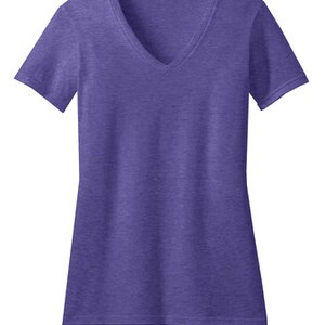 May include: A purple short-sleeved v-neck t-shirt made of a soft, comfortable fabric.