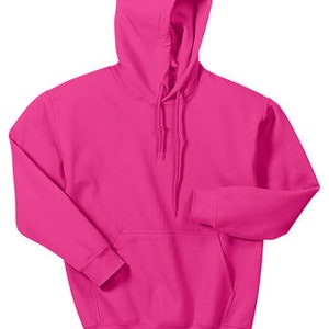 May include: A solid pink hooded sweatshirt with a kangaroo pocket. The sweatshirt has a drawstring at the hood and ribbed cuffs and hem. The garment is made of a soft, comfortable material.