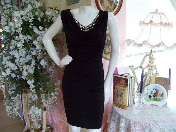 white christmas dresses A NIGHT TO REMEMBER SLINKY RHINESTONE MINI DRESS IN BLACK – AKIRA main image 1