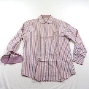 May include: A long-sleeve button-down shirt featuring a vertical striped pattern in shades of orange, blue, and white. The shirt has a spread collar, a front button placket, and cuffs with a contrasting purple and white geometric print pattern.