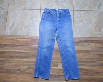 Vintage Calvin Klein Jeans Med Blue Wash - Original Calvin 5 Pocket Made in USA  Sz 9   Inseam:  30  Measured 28x29 high rise waist