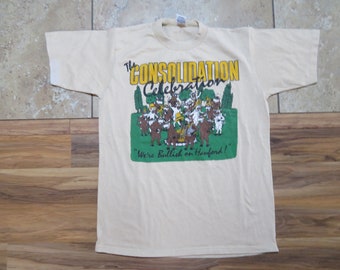 Vintage The Consolidation Celebration We're Bullish on Hanford 50/50 Humorous T-Shirt Beige Green Sz M Cow