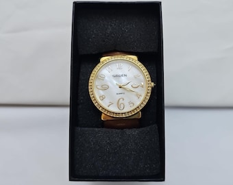 Orologio da polso da donna Gruen, cinturino rigido color cuoio, finiture in argento, quadrante bianco, al quarzo
