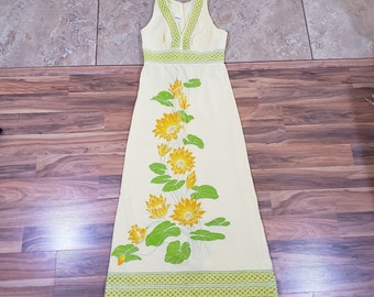 Vestido vintage Alfred Shaheen de los años 60-70 con cierre en la espalda, estampado floral en amarillo pastel, naranja y verde, talla 11-12.