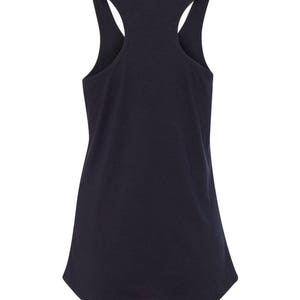 May include: A navy blue racerback tank top. The tank top has a scoop neck and a curved hemline. The back features a racerback design with wide straps. The fabric appears to be a soft, knit material.