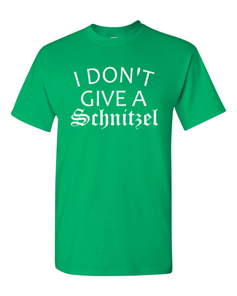 May include: Green t-shirt with white text that reads "I don't give a Schnitzel".