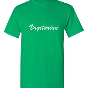 May include: A bright green t-shirt with the word "Vagitarian" in white script across the front. The shirt has short sleeves and a crew neck.