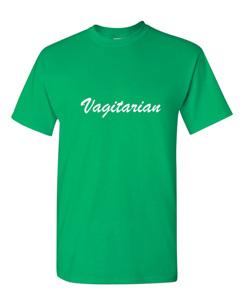 May include: A bright green t-shirt with the word "Vagitarian" in white script across the front. The shirt has short sleeves and a crew neck.