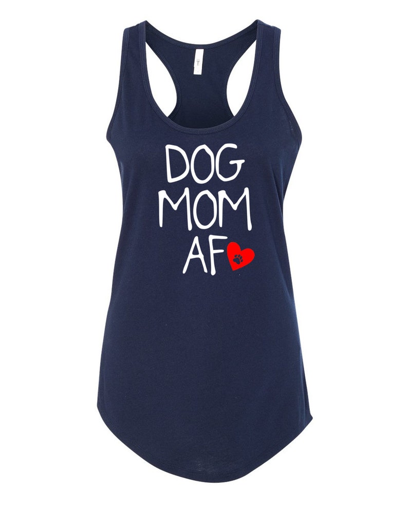 May include: Navy blue tank top with a racerback design. The white text reads "DOG MOM AF" with a red heart and paw print graphic. A casual, comfortable top for dog lovers.