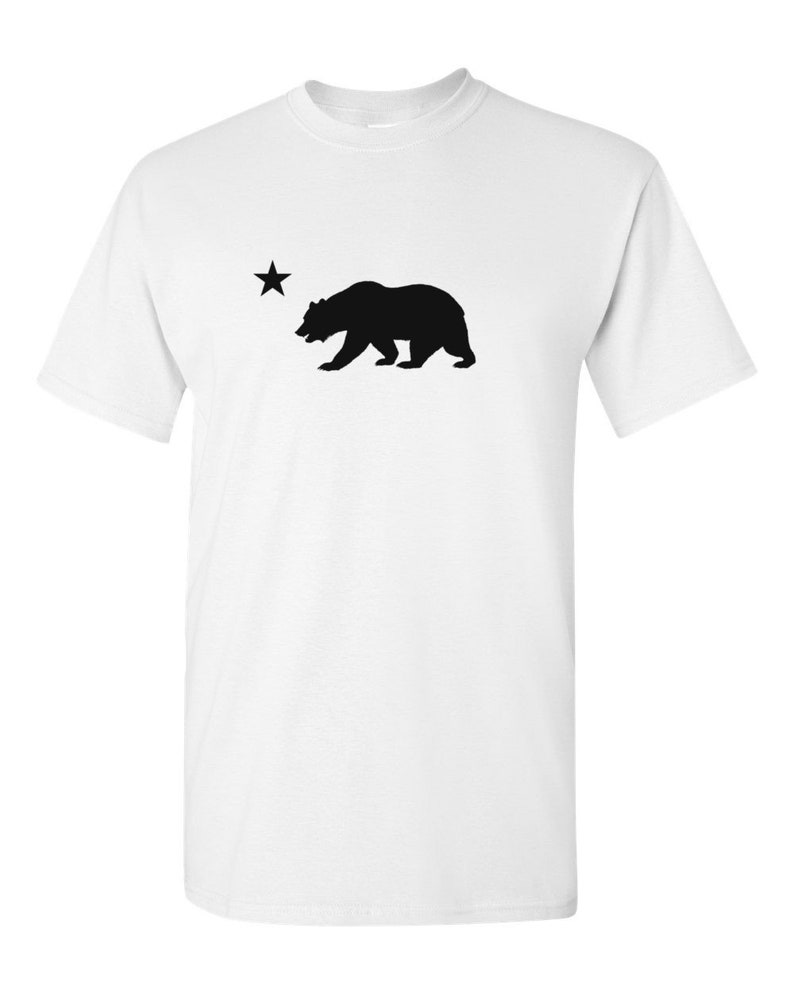 May include: White t-shirt with a black silhouette of a bear and a star, representing the California state flag.