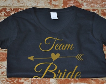 Team Bride Gold Shirt, Womens V Neck, Bachelorette Party Tee, Wedding Squad Top, Bridal Shower Gift, Bridesmaid Outfit, Funny Bride Tribe