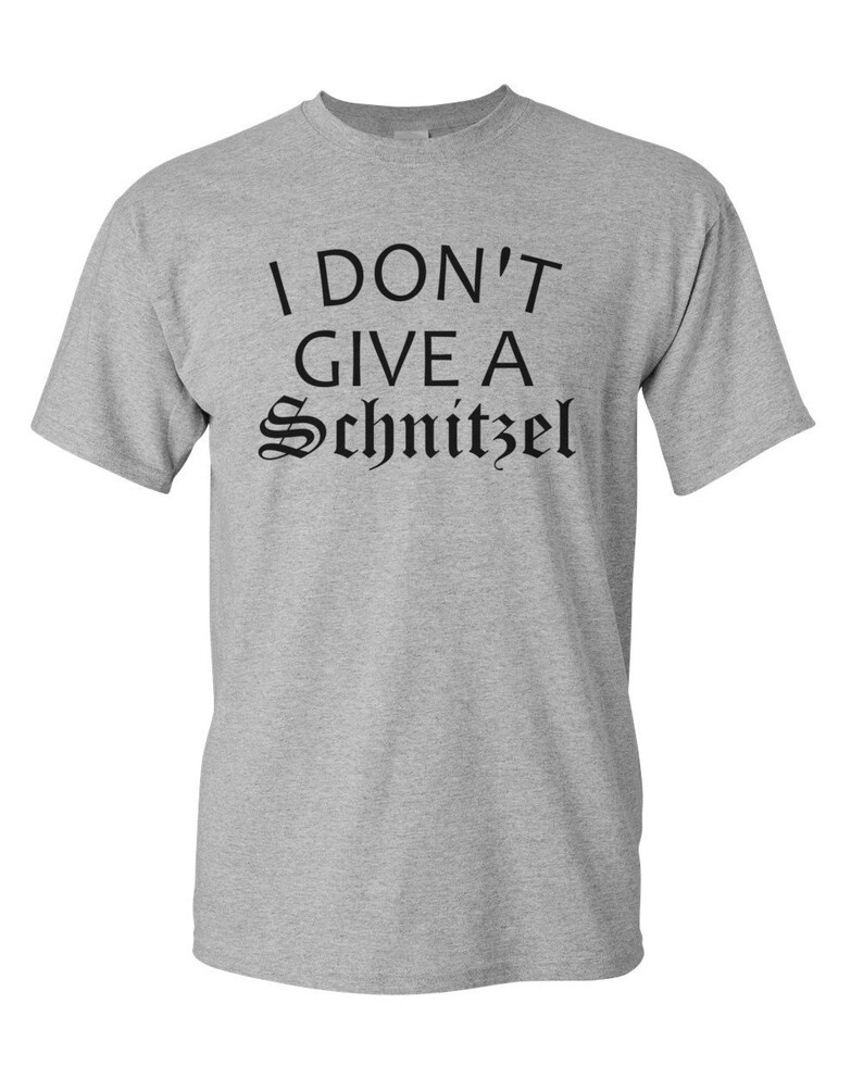 May include: A gray t-shirt with the text "I don't give a Schnitzel" printed in black.