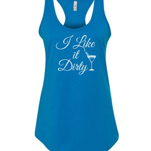 May include: A bright blue tank top with a racerback design. The front of the tank top features the white text "I Like it Dirty" with a martini glass graphic. The shirt is made of a soft material.