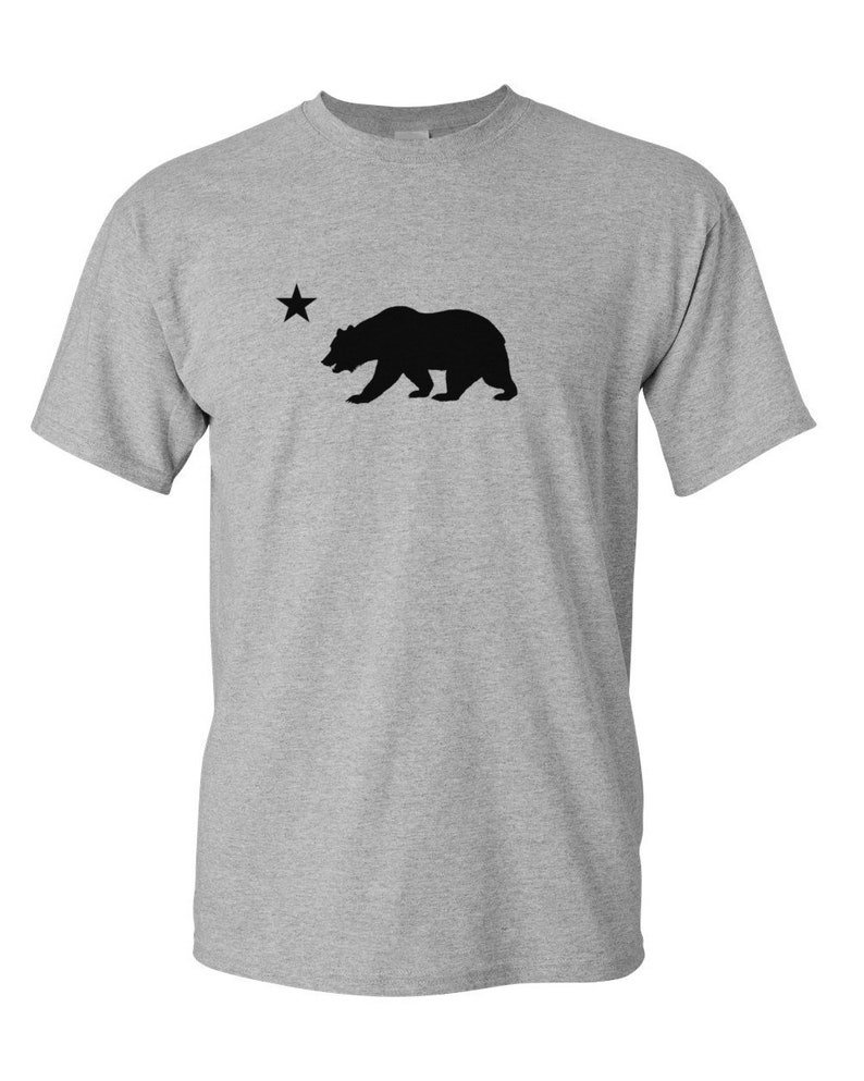 May include: A gray t-shirt with a black silhouette of a bear and a star, representing the California state flag.