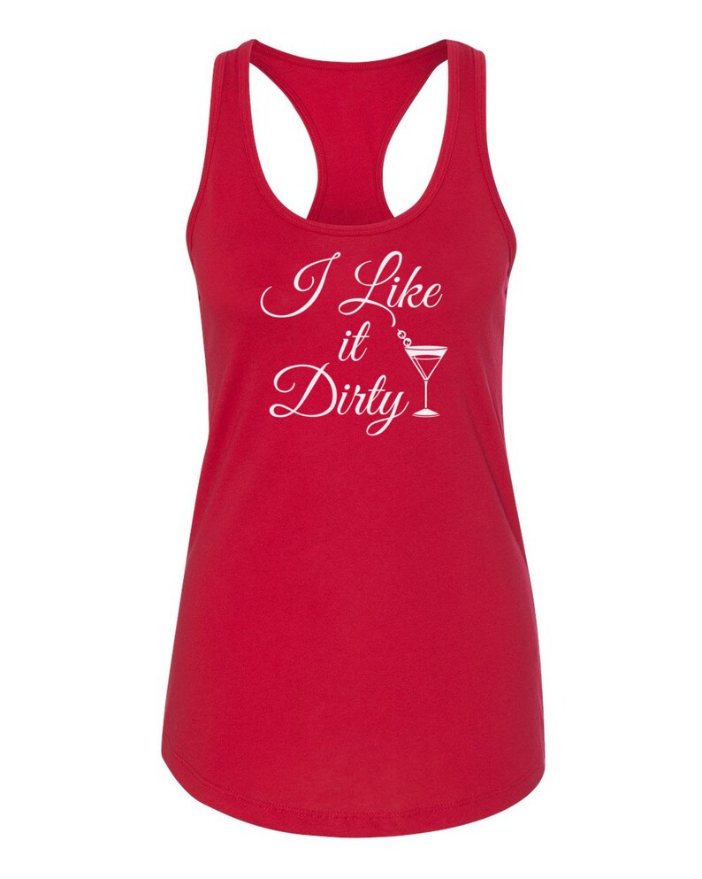 May include: A red racerback tank top with the phrase "I Like it Dirty" in white script and a martini glass graphic. The tank top has a scoop neck and a sleeveless design.