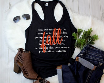 Tank Top - Celebrate Autumn: Bonfires, Apple Cider, and Corn Mazes - Stay Warm and Stylish with Our Fall Season Shirt - Racerback